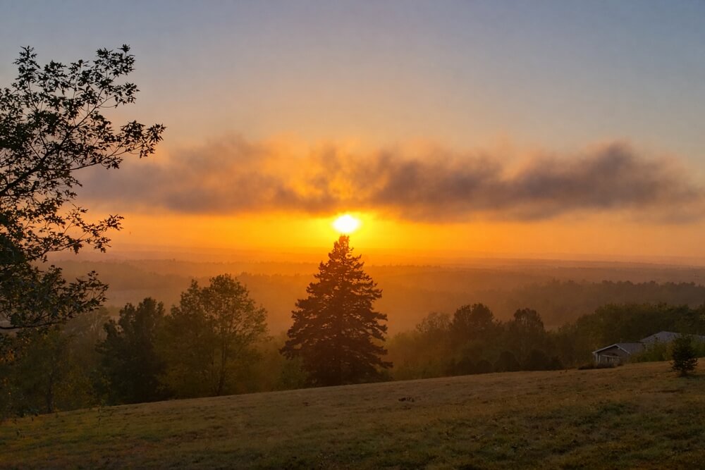 Sunset view from NATURA Wilderness Resort near Windsor Nova Scotia glamping retreat in the Annapolis Valley